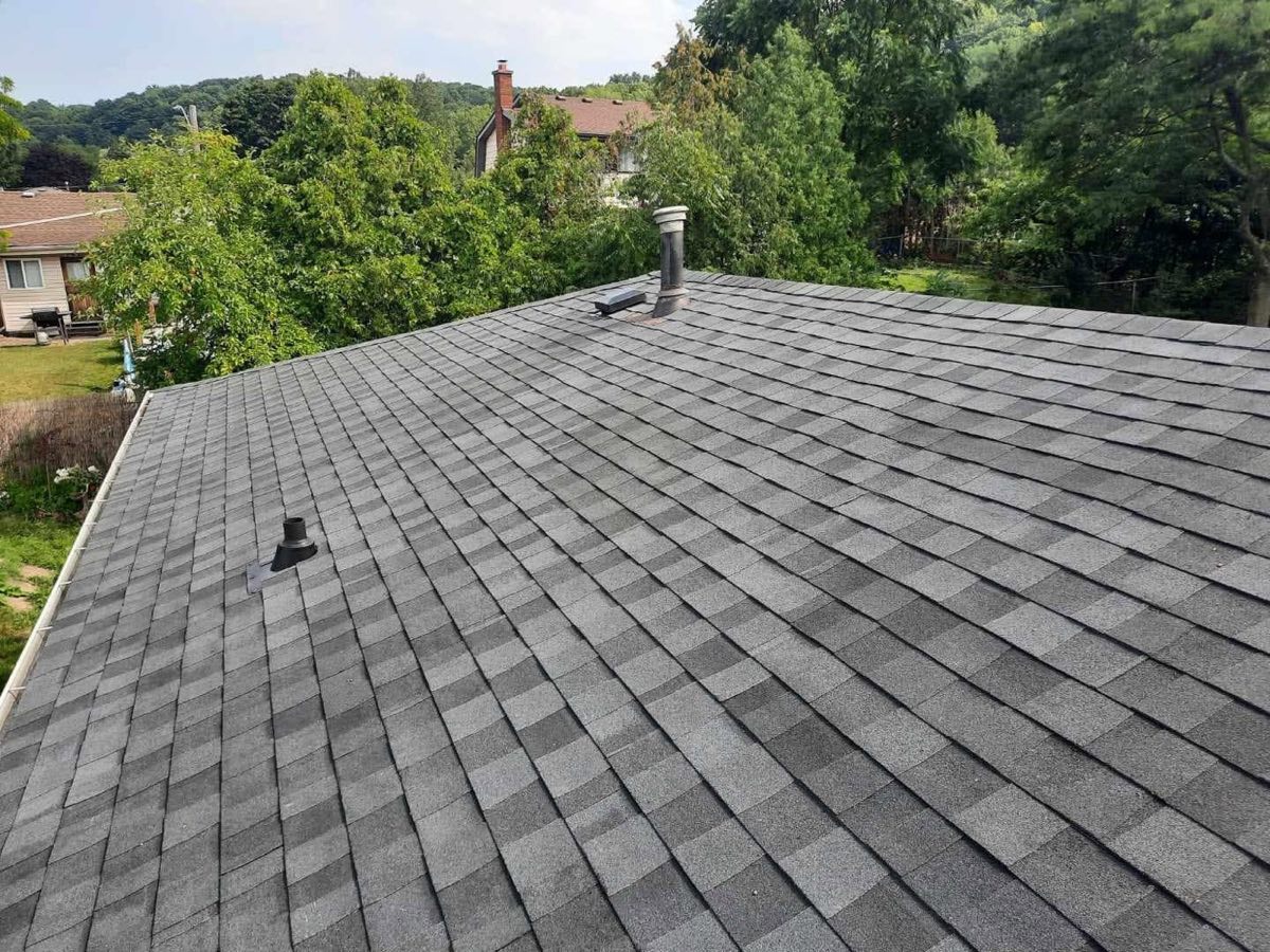 Finished architectural shingle roof photographed from above